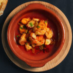 Cazuela de pulpo con langostinos al ajillo